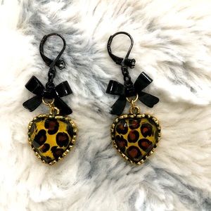 Women’s Betsey Johnson earrings.